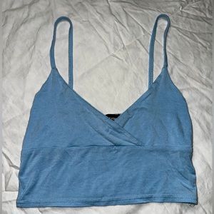 Pretty Little Thing baby blue crossed cropped tank top